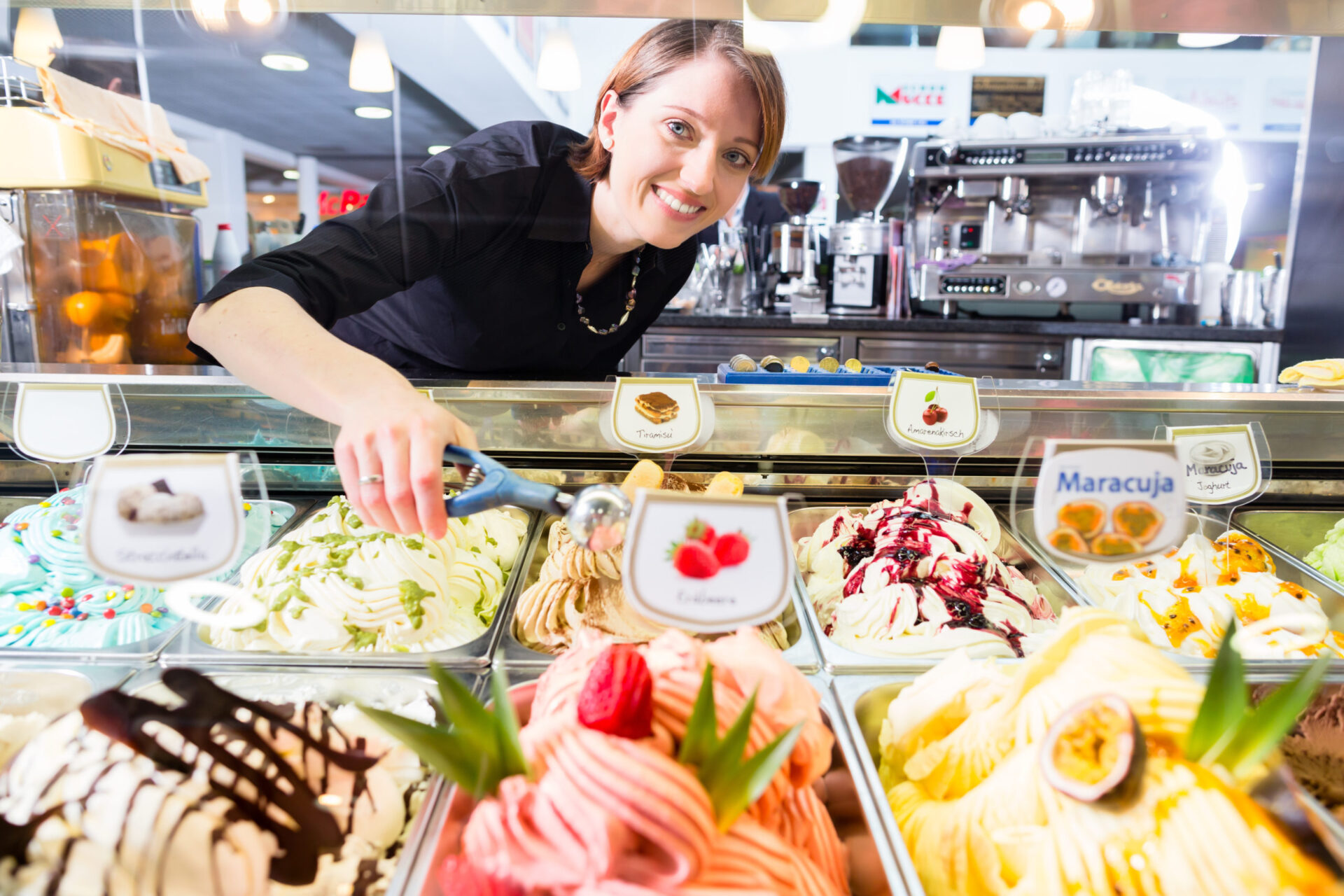Ice, cream, parlor, sales, girl, seller, ice-cream, "ice cream", service, ball, scoop, bar, counter, cafe, food, gastronomy, select, selection, portion, dish, waffle, wafer, cone, fruit, summer, cold, icy, sorbet, work, working, job, occupation, smiling, friendly, beautiful, woman, female, people, Caucasian